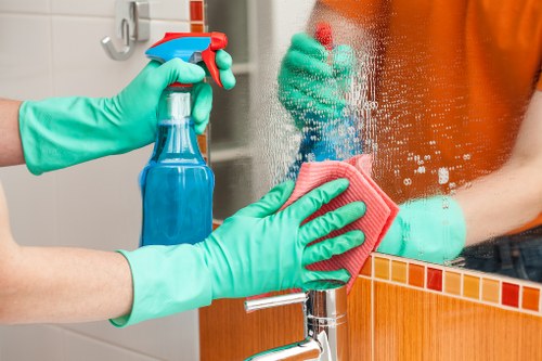 Person raising a cleaning service complaint in a professional setting